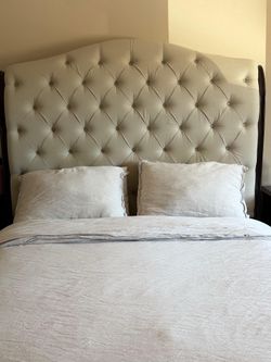 Gorgeous tufted bed with 2 night stands