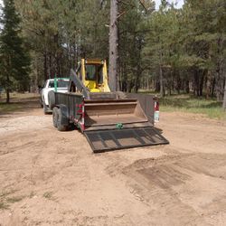 New Holland Skid Steer With Trailer 