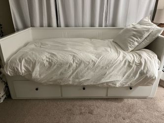 Like new Ikea twin trundle bed with storage and mattress
