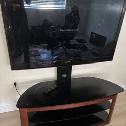 TV w/ Mounted Stand 