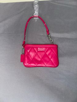 Poppy Coach wristlet - fuchsia