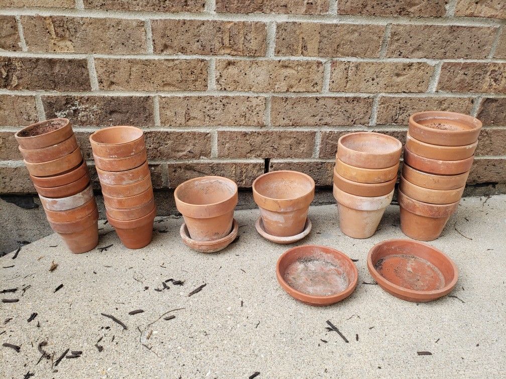 Terra Cotta Plant Pots, also have Ceramic and Glass