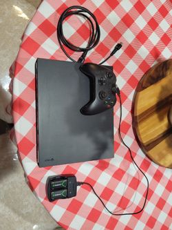 Working Xbox One X 500gb w/ controller and battery charging kit, power cable not included