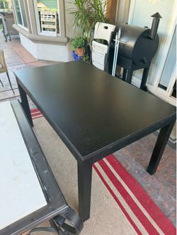 Black wooden dinner table