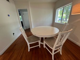 Round dining table and chairs