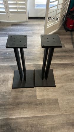 A pair of speakers stands