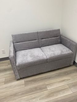 2 Person Couch that flattens into Bed