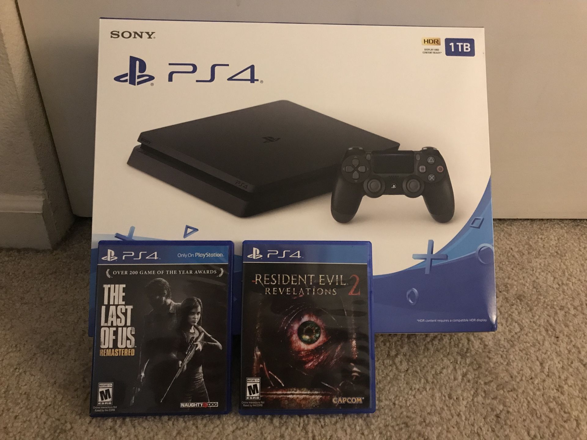 Brand new unopened PS4 1Tb + 2 games