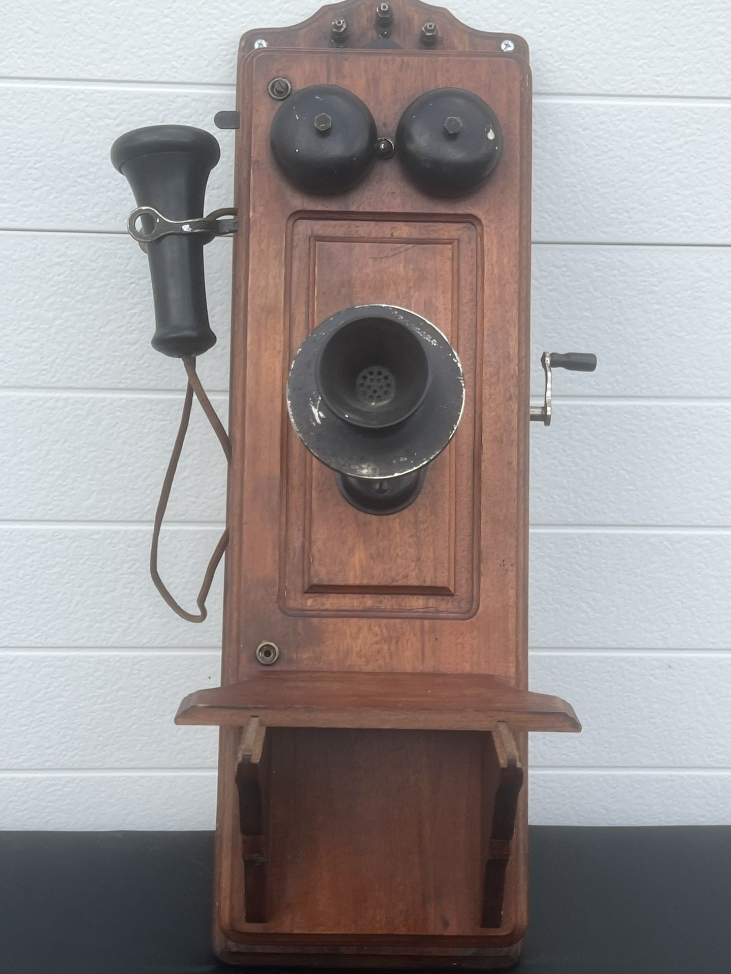 Antique Kellogg Wooden Crank Wall Phone Imperfections. This item is used in good condition with some cosmetic blemishes and imperfections. The cosmeti