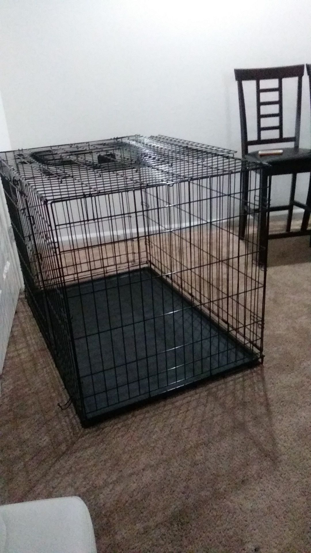 Dog cage only use it 3 time large cage doors open on 2 side