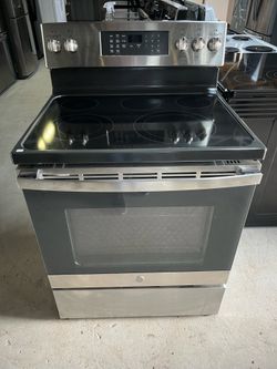 Ge stainless steel stove like new-60 DAY WARRANTY