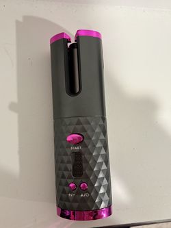 Cordless auto spinning hair curler