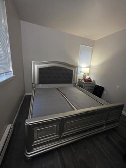 Silver Bed Frame with Gray Tufted Headboard