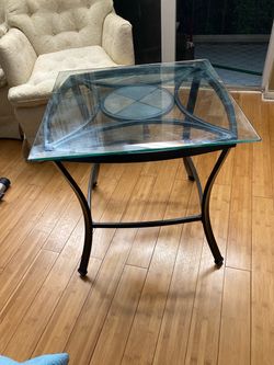 Solid Iron and marble with glass top 25 inches tall 24x24 width table $20