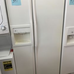 GE Side By Side Refrigerator White 36” Excellent  .  Warranty  . Delivery Available . 2203 Fowler St. 33901