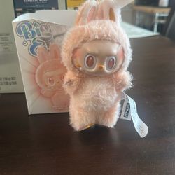 POP MART “Pucky” elf figure — a collectible designer toy.