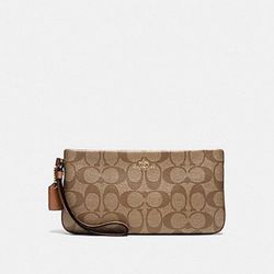 Coach Brown Saddle Signature Pvc Large Wristlet In Khaki/Saddle F65748 Wallet