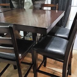Pub height dining room table with chairs