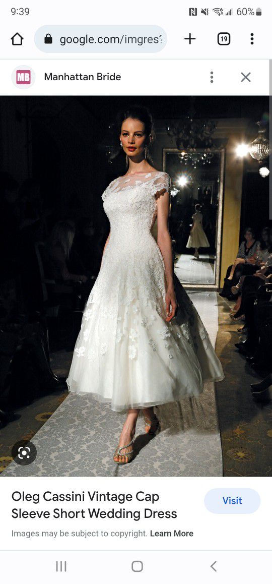 Oleg Casinni Wedding Dress