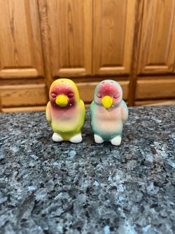 Vintage Ceramic colorful Birds  pair of salt and pepper shakers.  Preowned never used.  One shaker has paint wear looks like a manufacturing error.  N