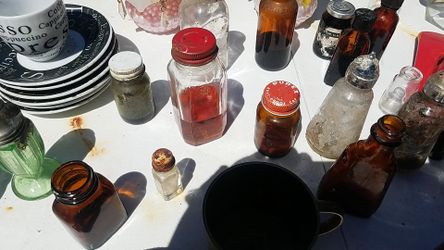Antique medicine bottles some Folsom empty all very old some Avon various others also includes salt and pepper shakers and other various glassware