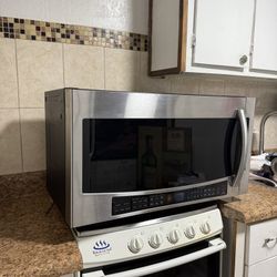 Samsung - 2.1 Cu. Ft. Over-the-Range Microwave with Sensor Cooking and Wi-Fi Connectivity - Stainless Steel