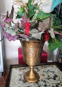 Vase with floral arrangement