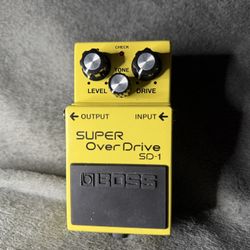 Boss SD-1 Super OverDrive pedal, a classic compact guitar effect pedal designed to emulate the sound of a cranked tube amplifier