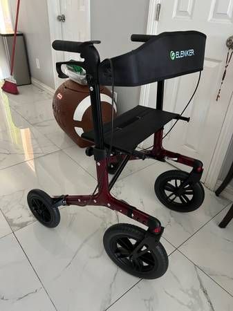 Walker Rollator / chair new asking $100 paid 380 for it never used