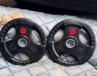 PAIR OF HARD RUBBER EASY GRIP 35 LB. OLYMPIC PLATES