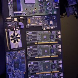 Assorted computer components (motherboards, batteries, graphics card, etc)