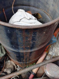 Black 30 gallon steel drum 🛢️