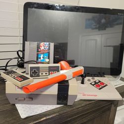 Nintendo Entertainment System. NES with MARIO  BROS/DUCK HUNT
