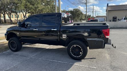 04 Nissan tita LE crew cab 2wd 4d