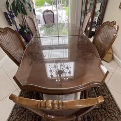 Beautiful antique Dinning Table. 6 padded chairs and China. 