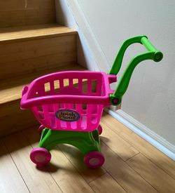 Kids wish I was pink and green shopping cart toy