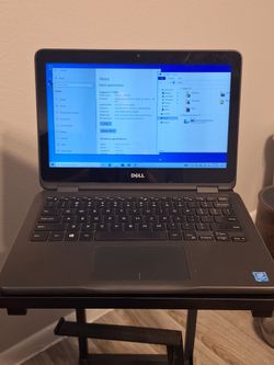 Dell Inspiron 11" 2-in-1 touchscreen netbook.