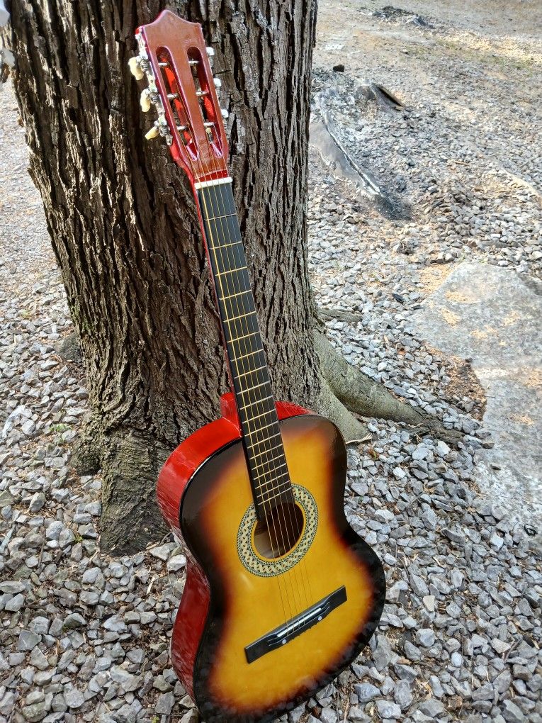 Brand New Acoustic Guitar With A Beautiful Vintage Sunburst Finish 