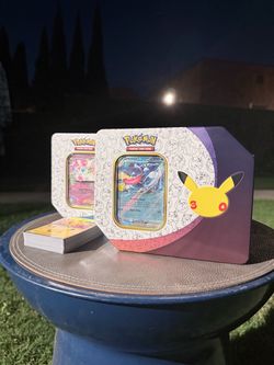 Two Pokemon: 30th Celebration Tins -opened-