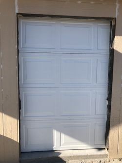 GARAGE DOOR REPAIR AND INSTALLATION