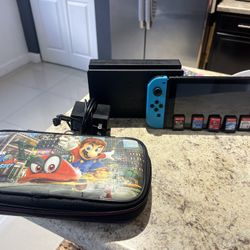 nintendo switch, 6 games, case, charger and tv display is included 