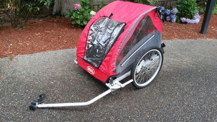 Bell bike trailer holds 2 kids