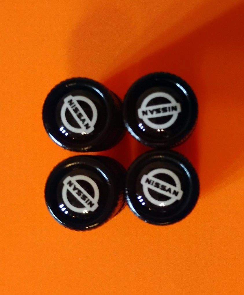 Nissan valve caps NEW