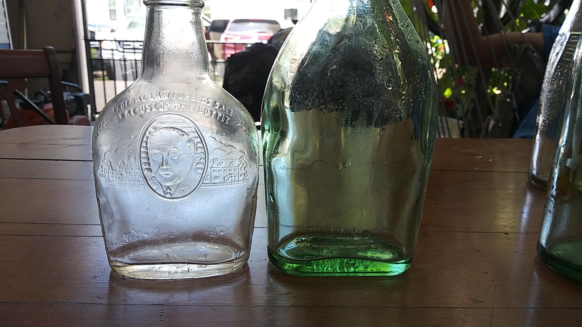Vintage ron Bacardi antique bottle along with vintage Harry e antique bottle