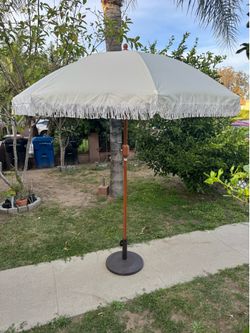 Tables chairs and umbrellas