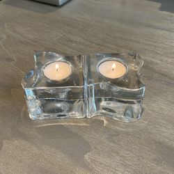 A pair of Orrefors Sweden crystal candle holder