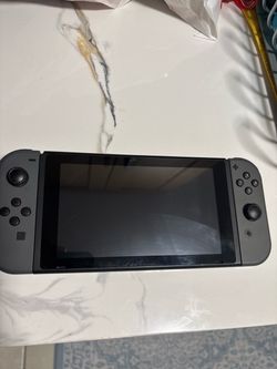 Nintendo Switch with Two Gray Joycons and 256 GB MicroSD
