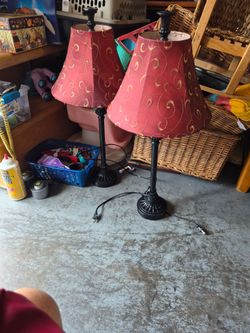 The living room lamps, two of them with shade