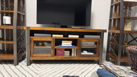 media stand and bookshelves