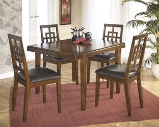 Ashley dining set @ wholesale furniture center 25 W 39th St Kansas City mo 64111